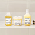 Davines DEDE Conditioner with the DEDE range on a bathroom shelf